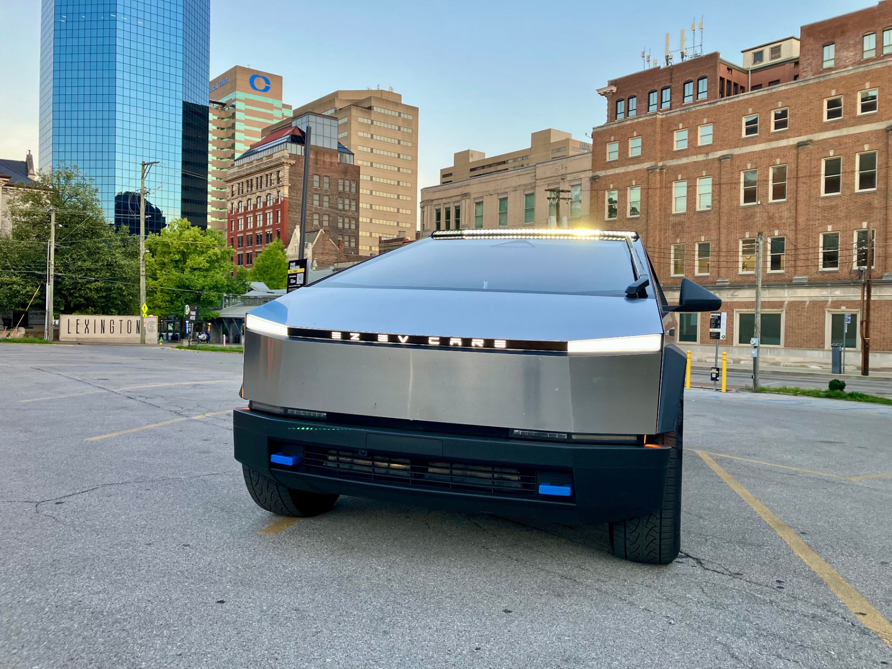 Tesla Cybertruck front view with illuminated EZ EV CARE light bar