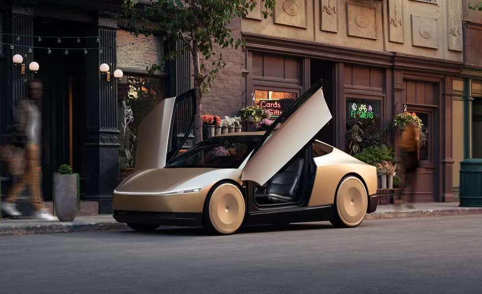 Tesla Cybercab robotaxi with butterfly doors open, parked on a city street in front of storefronts